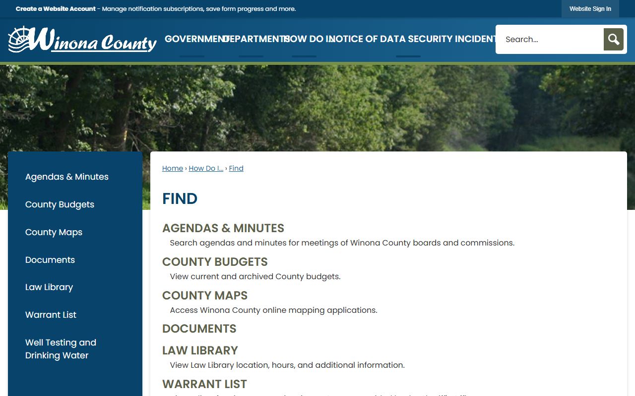 County Find page linking to the active warrant list and law library.